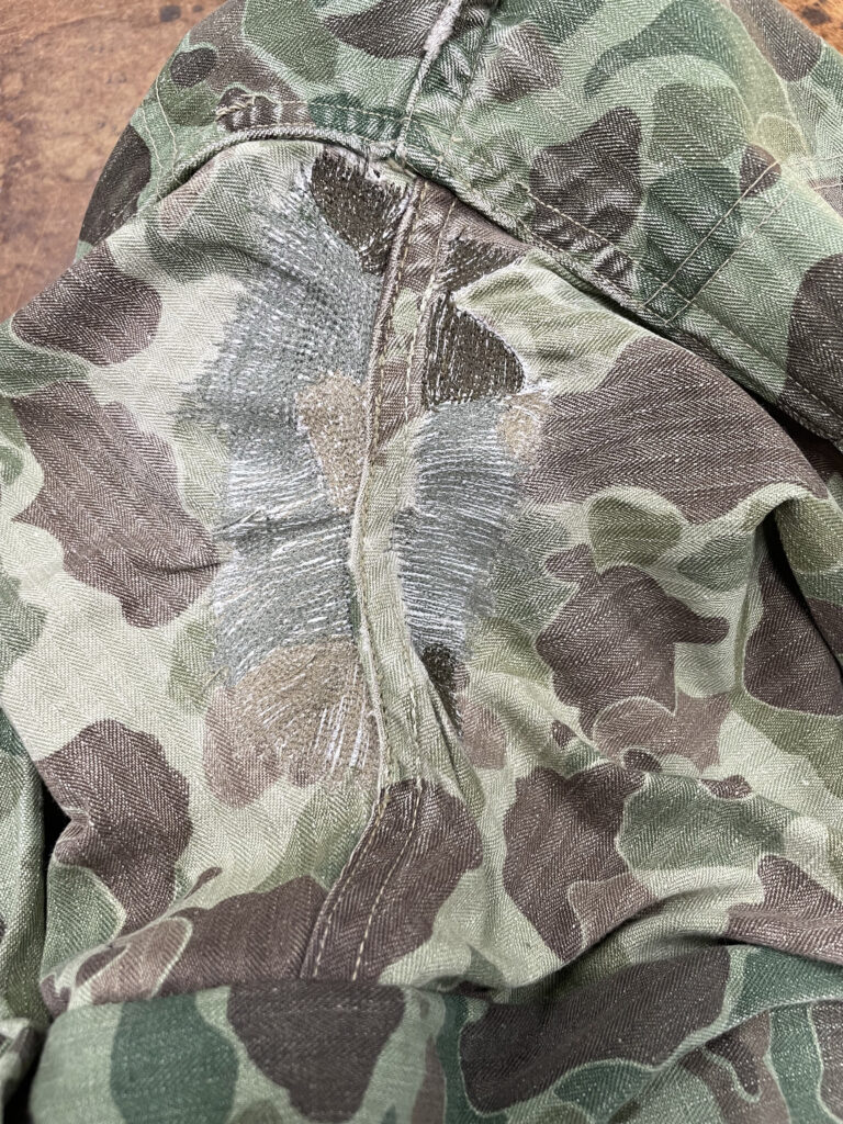 invisible mending on a patterned fabric with color matching 